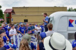Dean Phillips rallies folks before a parade. Dean Phillips rallies folks before a parade.