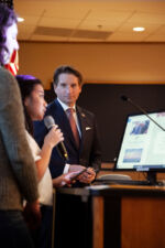 Dean listens to students at a Minnetonka High School event. Dean listens to students at a Minnetonka High School event.
